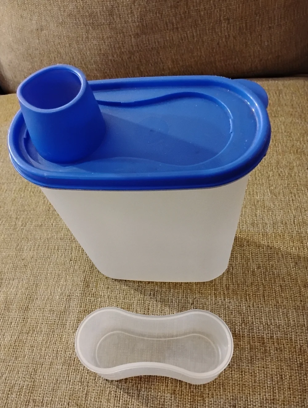 Tupperware container (2.3 litter,) , top holds 8 oz
